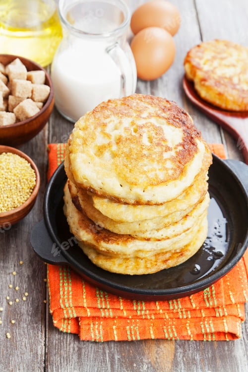 Preview: Millet Pancakes In A Frying Pan On The Table