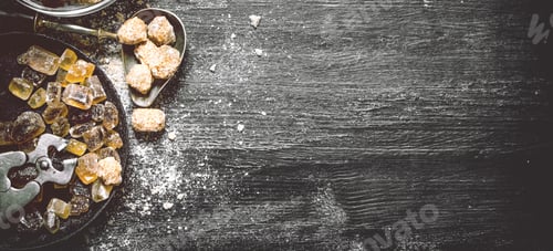 Preview: Brown Cane Sugar. On A Black Rustic Background.