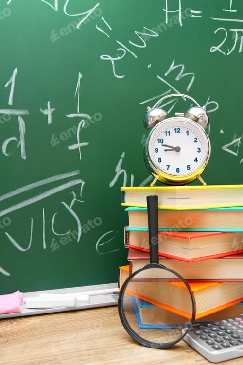 Preview: Back To School. School Accessories Against A School Board.