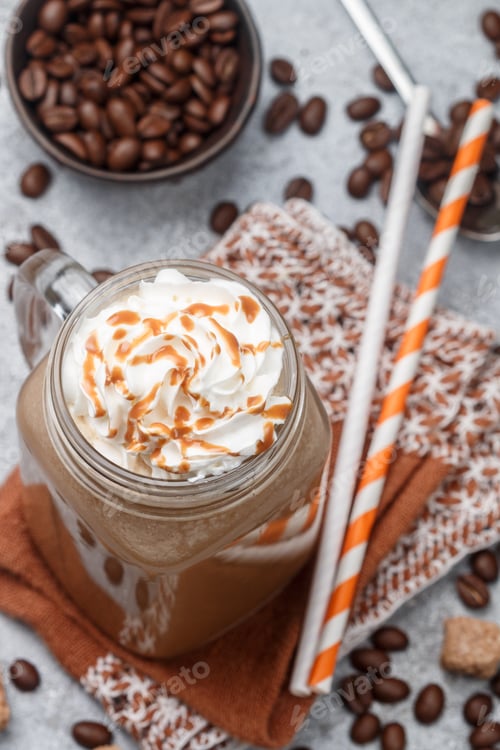 Preview: Iced Coffee Latte In A Mason Jar With Caramel Syrup And Whipped Cream. Selective Focus