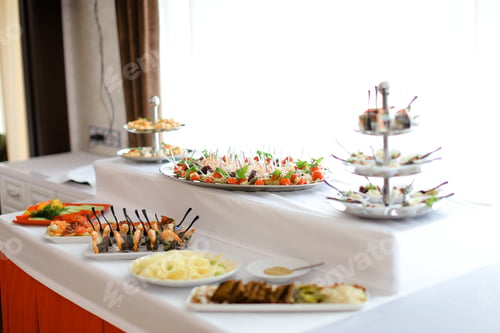 Preview: Delicious Meals On Table With White Tablecloth. Concept Of Food For Wedding Banquet.