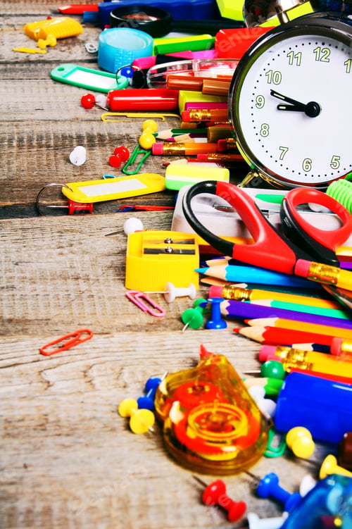 Preview: School Tools. On A Wooden Background.