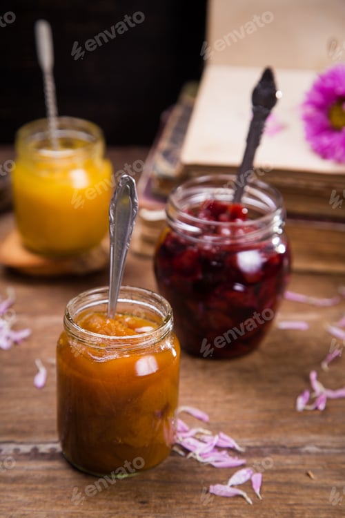Preview: Set Of Jam And Honey In Glass Container With Flower And Book