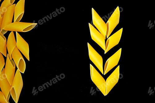 Preview: Crude Pennoni Pasta On A Black Background. Italian Pasta.