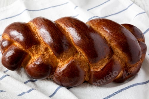 Preview: Homemade Jewish Challah Bread On Cloth, Side View. Close-Up.