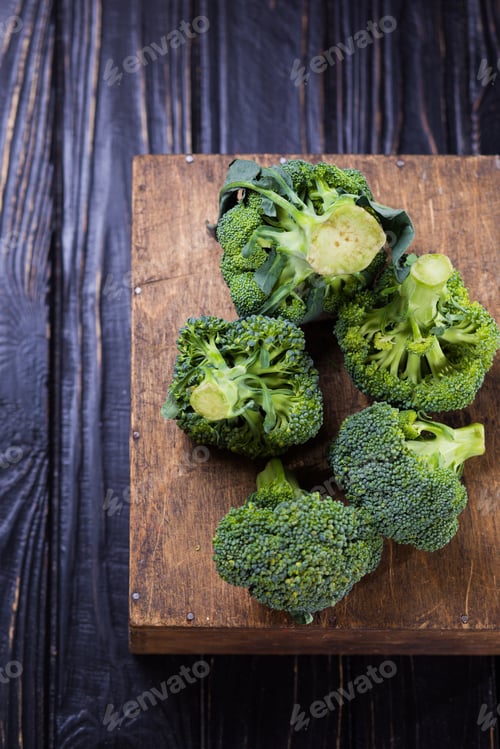 Preview: Fresh Raw Ripe Broccoli In Studio On Wooden Background