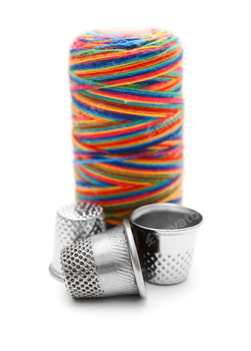 Preview: Threads And Thimbles. On A White Background.