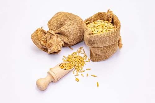 Preview: Whole Peeled Wheat Grains Isolated On White Background. A Traditional Ingredient In Healthy Food