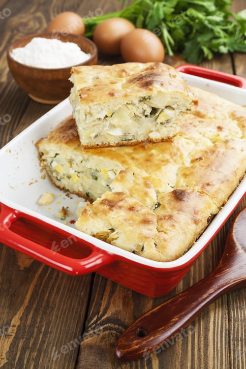 Preview: Homemade Pie With Cabbage And Eggs In A Ceramic Pot