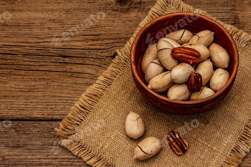 Preview: Ripe Pecan On Vintage Wooden Background. Traditional Ingredient For Pecan Pie In Usa