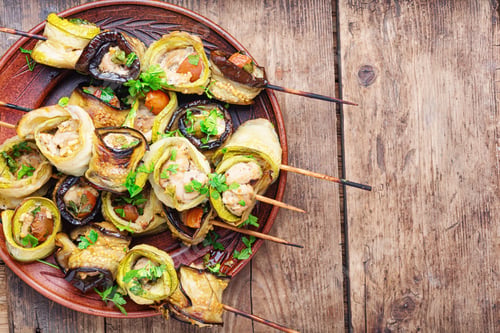 Preview: Eggplant And Zucchini Stuffed With Chicken Meat.Skewers Of Grilled Meat And Vegetables