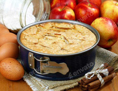 Preview: Apple Pie In A Baking Dish On A Wooden Table