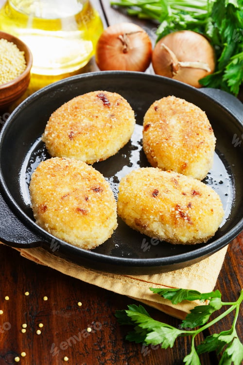 Preview: Millet Patties In A Frying Pan On The Table