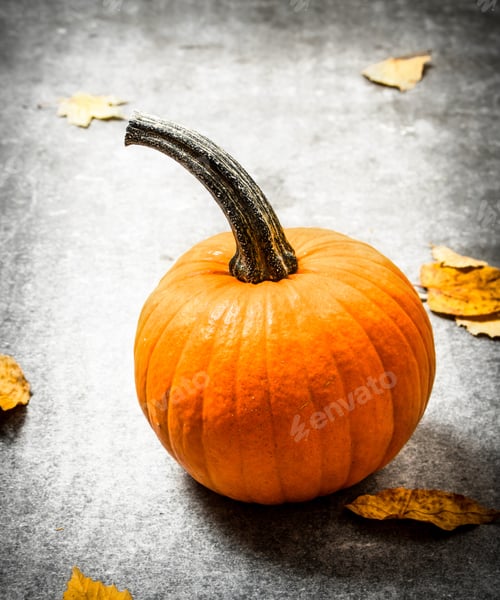 Preview: Autumn Harvest. Pumpkin With Autumn Leaves. On The Stone Table.