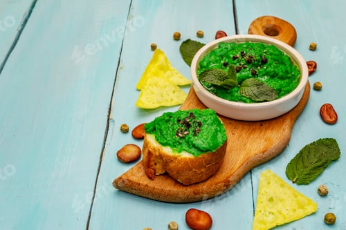 Preview: Hummus, Healthy Vegan (Vegetarian) Food. Edamame Dry Beans, Fresh Mint. Trendy Turquoise Wooden