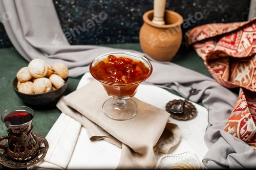 Preview: Cup Of Tea, Sweet Cake And Jam On The Wood Table