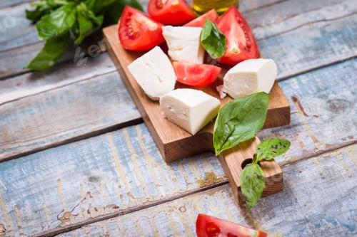Preview: Ingredients For Caprese Salad-Fresh Tomatoes And Mozzarella