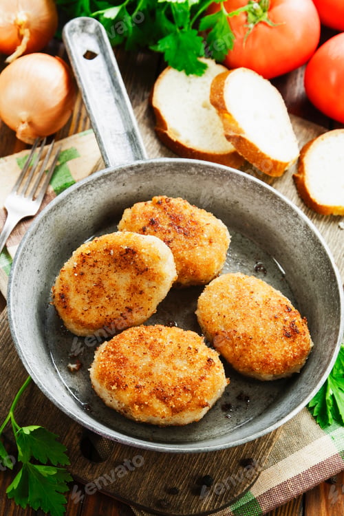 Preview: Burgers In The Pan On The Wooden Table