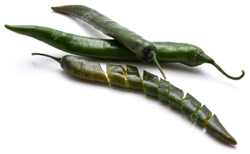 Preview: Sliced Green Chili Pepper And Two Whole Isolated On White Background