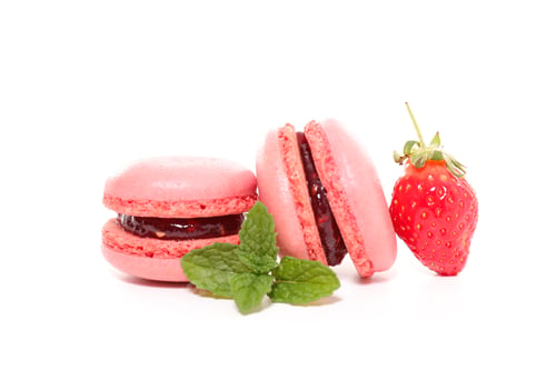 Pink Macarons with Strawberry on White Background