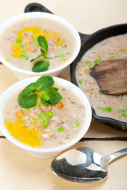 Preview: Hearty Middle Eastern Chickpea And Barley Soup With Mint Leaves On Top