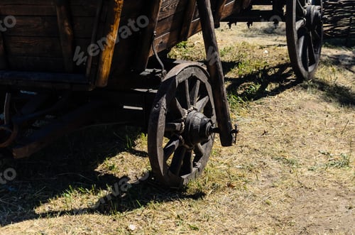 Preview: Old Rustic Wooden Cart On A Ground
