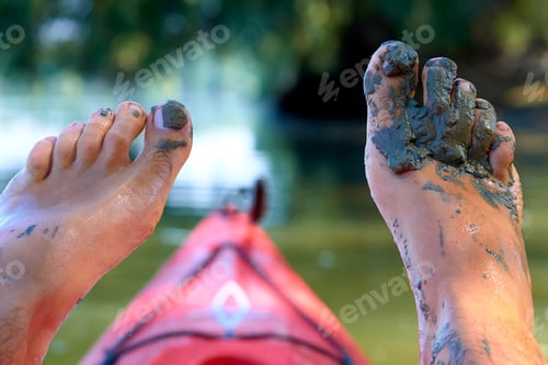 Preview: Men'S Bare Feet In Mud On Red Kayak