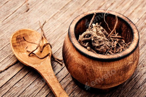 Preview: Dried Valerian Roots On Wooden Background.Valeriana Officinalis