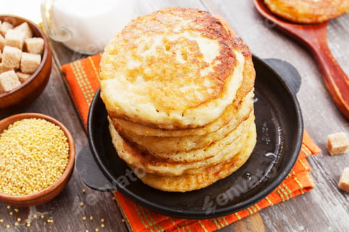 Preview: Millet Pancakes In A Frying Pan On The Table