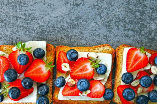 Preview: Healthy Toasts With White Cheese, Fresh Strawberries And Blueberries. The Concept Of A Healthy