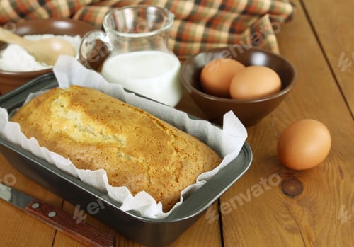 Preview: Cake In The Baking Dish On A Wooden Table