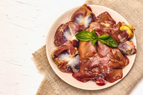 Preview: Fresh Raw Chicken Offal: Heart, Liver, Stomach. Dry Spices, Sea Salt, Chili Pepper. White Putty