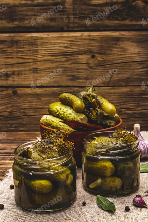 Preview: Marinated Pickled Cucumbers With Spices And Herbs. Traditional Fermented Appetizer In Glass Jars