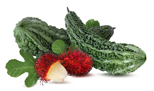Preview: Momordica Charantia Fruit And Rambutan Isolated On White Background