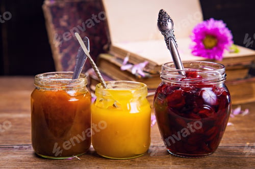 Preview: Set Of Jam And Honey In Glass Container With Flower And Book