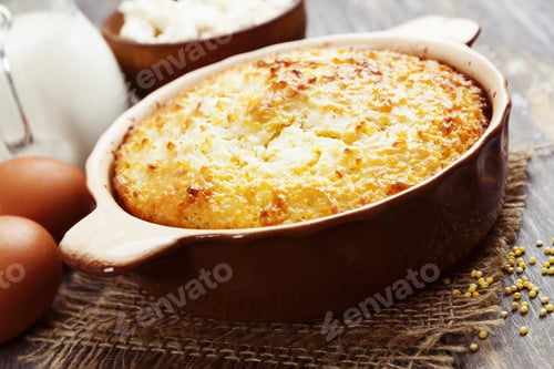 Preview: Casserole With Millet And Curd On The Wooden Table