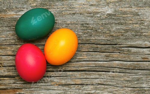 Preview: Colorful Easter Eggs on Rustic Wood Background