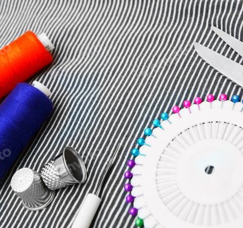 Preview: Sewing Accessories On A Fabric.