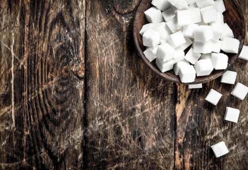 Preview: Cubes Of Sugar In A Bowl. On A Wooden Background