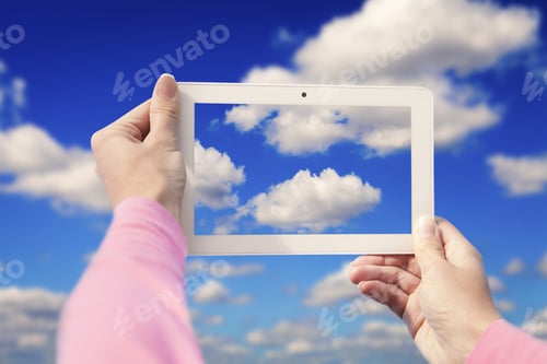 Preview: Tablet Computer Isolated In A Hand On The White Backgrounds