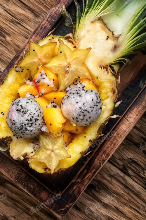 Preview: Tropic Fruits Salad In Pineapple Cut In Half