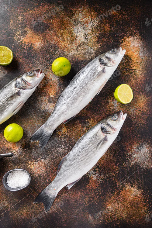 Preview: Set Of Sea Bass With Spices And Herbs Ingredients Over Darc Rustic Background Top View