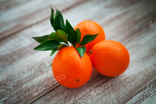 Preview: Orange Isolated On A Wooden Background