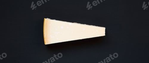 Preview: Parmesan Cheese On Dark Surface, Top View. From Above, Overhead, Flat Lay.