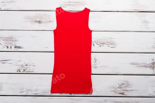 Preview: Bright Red Summer T-Shirt. Women Knitted T-Shirt On A Wooden Background.