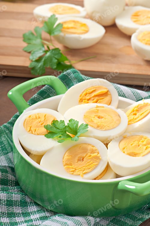 Preview: Boiled Eggs In A Bowl Decorated With Parsley Leaves
