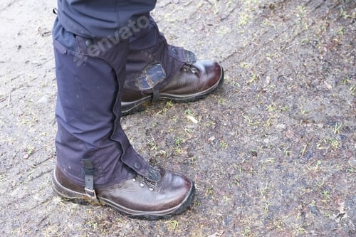 Preview: Walking Hiking Boots Being Worn With Gaitor By Senior Elderly Woman