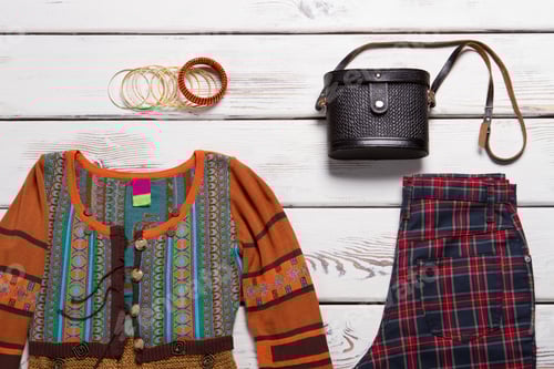 Preview: Fashionable Outfit on White Wooden Surface