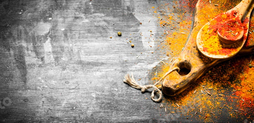 Preview: Ground Indian Spices And Herbs In Spoons. On The Black Chalkboard.