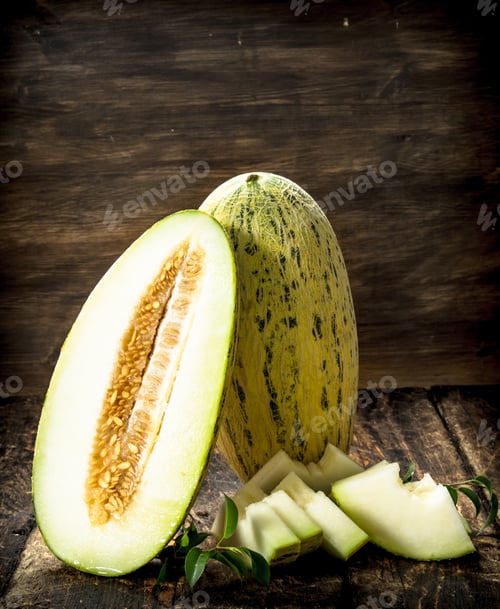 Preview: Ripe Fresh Melon. On A Wooden Background